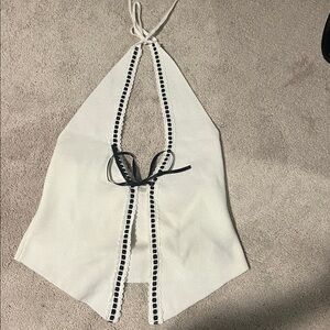 size medium white and black cropped halter top with tie in front